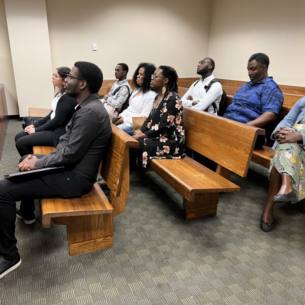 Participants sit together at Circuit Court to learn about metro government
